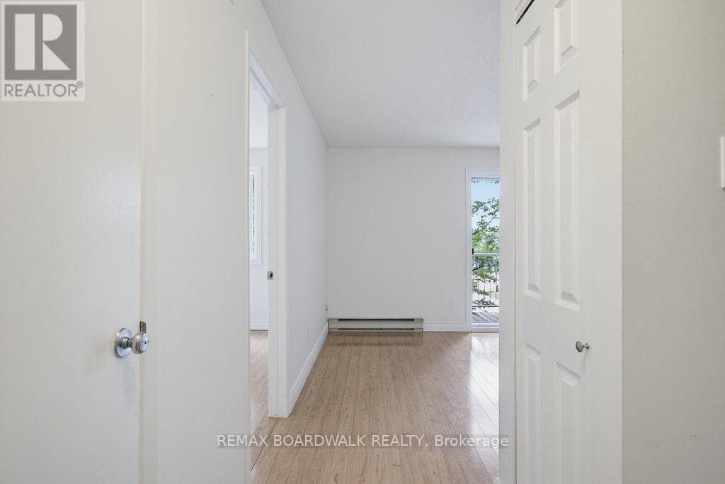 207 - 250 BRITTANY DRIVE — photo 3