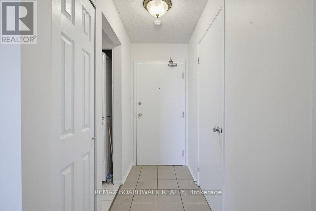 207 - 250 BRITTANY DRIVE — photo 2